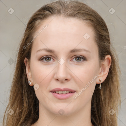 Joyful white young-adult female with long  brown hair and grey eyes