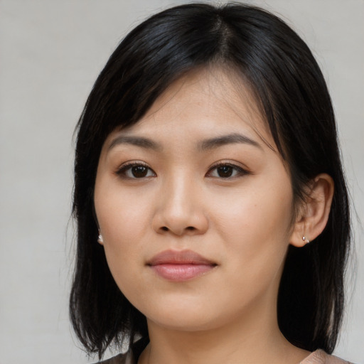 Neutral white young-adult female with medium  black hair and brown eyes