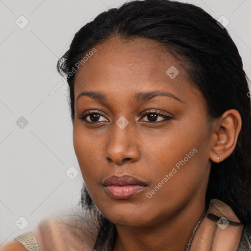 Neutral black young-adult female with long  black hair and brown eyes