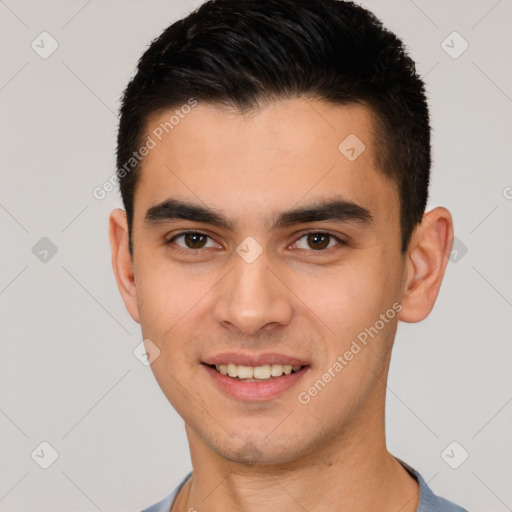 Joyful white young-adult male with short  brown hair and brown eyes