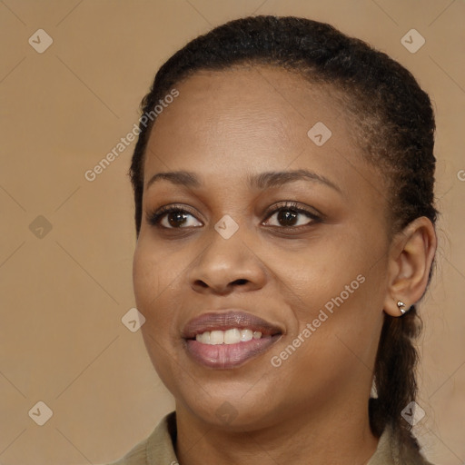 Joyful black young-adult female with medium  brown hair and brown eyes