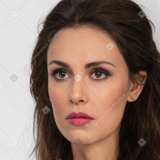 Neutral white young-adult female with long  brown hair and brown eyes