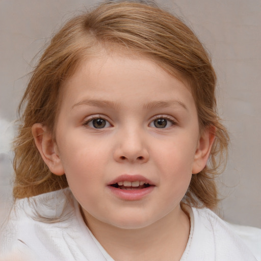 Joyful white child female with medium  brown hair and blue eyes