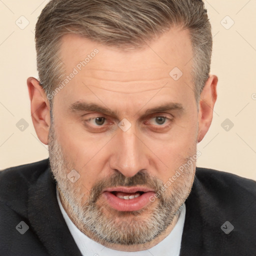 Joyful white middle-aged male with short  brown hair and brown eyes