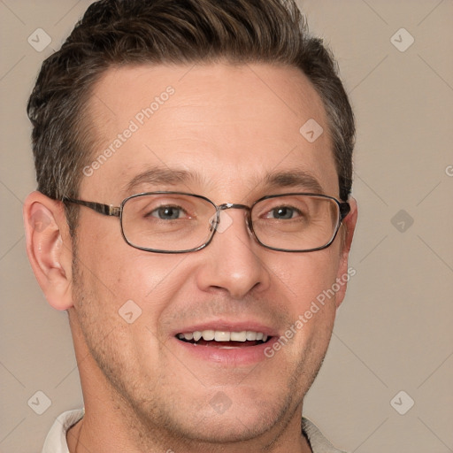 Joyful white adult male with short  brown hair and grey eyes