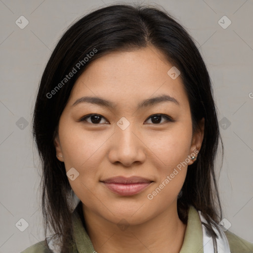 Joyful latino young-adult female with medium  brown hair and brown eyes