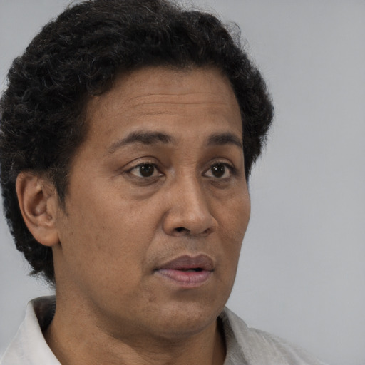Neutral black adult female with short  brown hair and brown eyes