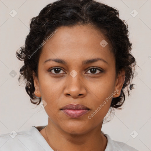 Neutral black young-adult female with short  brown hair and brown eyes