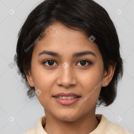 Joyful latino young-adult female with medium  brown hair and brown eyes