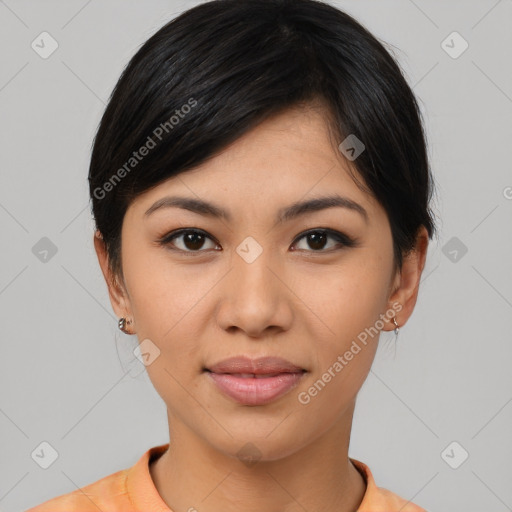 Joyful asian young-adult female with medium  black hair and brown eyes