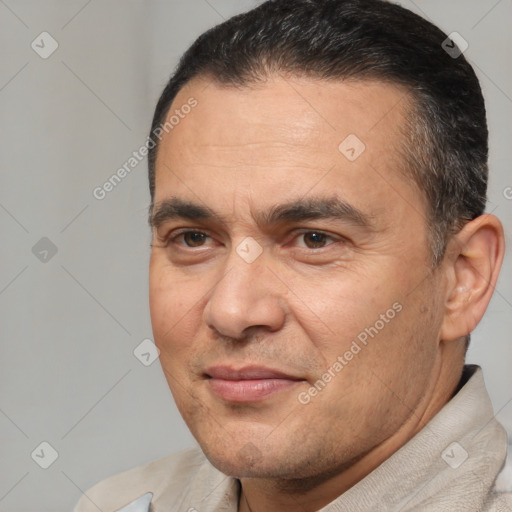 Joyful white adult male with short  brown hair and brown eyes