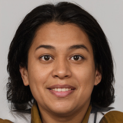 Joyful asian young-adult female with medium  brown hair and brown eyes