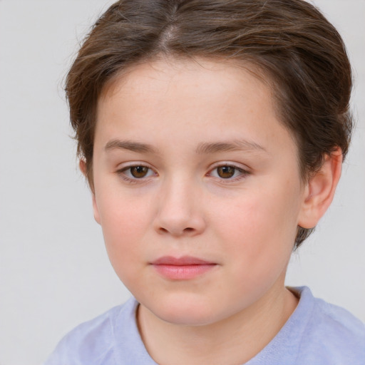 Joyful white child female with short  brown hair and brown eyes