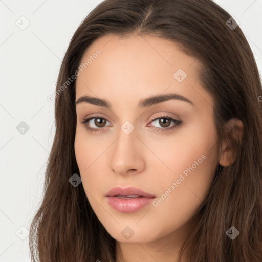 Neutral white young-adult female with long  brown hair and brown eyes