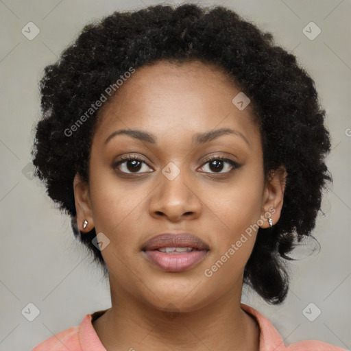 Joyful black young-adult female with medium  black hair and brown eyes