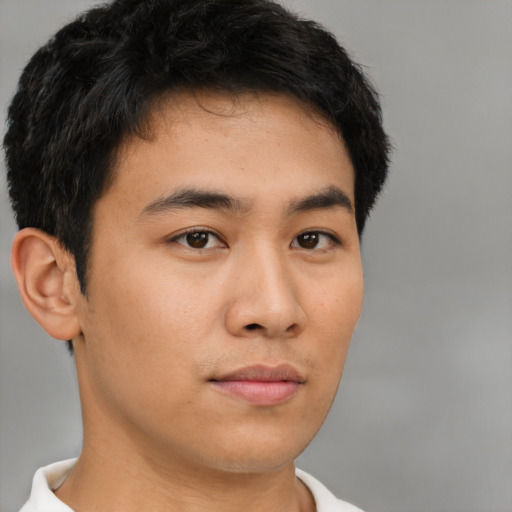 Neutral asian young-adult male with short  brown hair and brown eyes