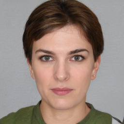 Neutral white young-adult female with short  brown hair and brown eyes