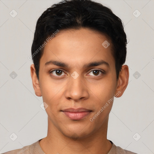 Joyful latino young-adult male with short  black hair and brown eyes