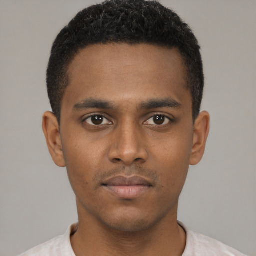 Neutral latino young-adult male with short  brown hair and brown eyes