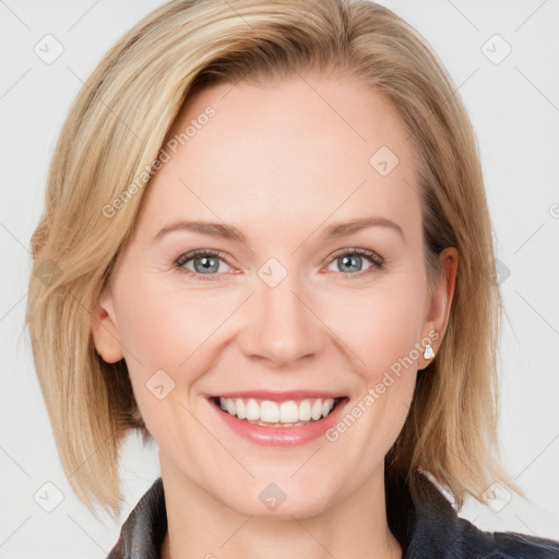 Joyful white young-adult female with medium  brown hair and blue eyes