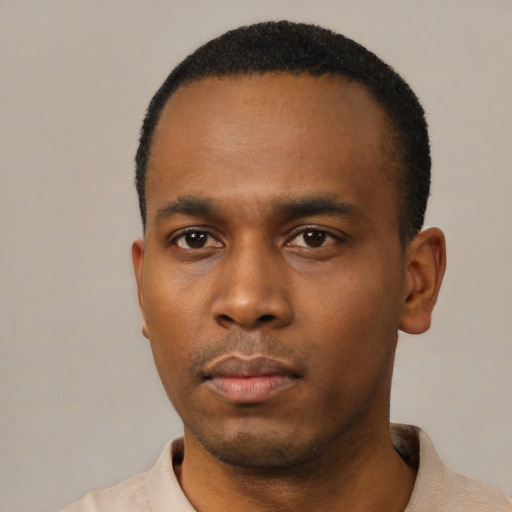 Neutral black young-adult male with short  black hair and brown eyes