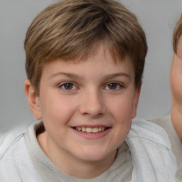 Joyful white child female with short  brown hair and brown eyes