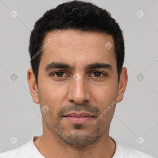 Neutral white young-adult male with short  black hair and brown eyes
