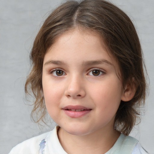 Joyful white child female with medium  brown hair and brown eyes