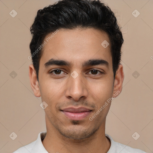 Joyful latino young-adult male with short  brown hair and brown eyes