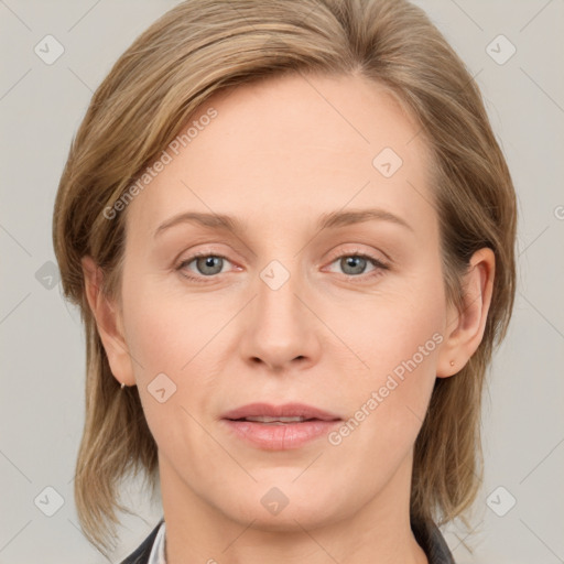 Joyful white young-adult female with medium  brown hair and blue eyes