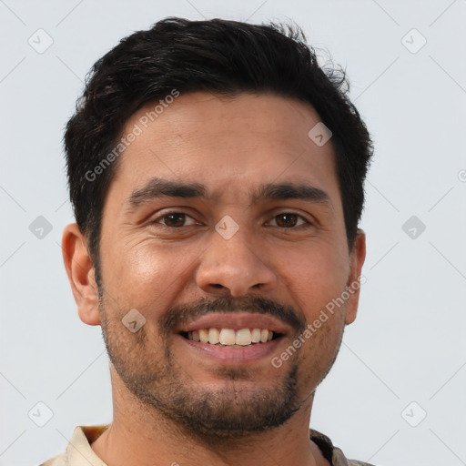 Joyful asian young-adult male with short  black hair and brown eyes