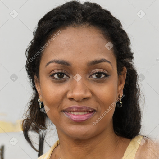 Joyful black young-adult female with medium  brown hair and brown eyes