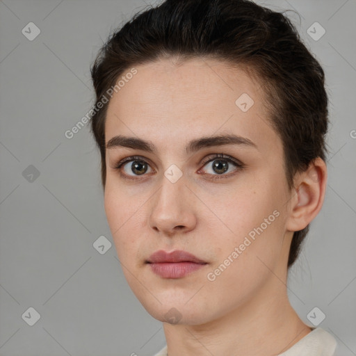 Neutral white young-adult female with short  brown hair and brown eyes