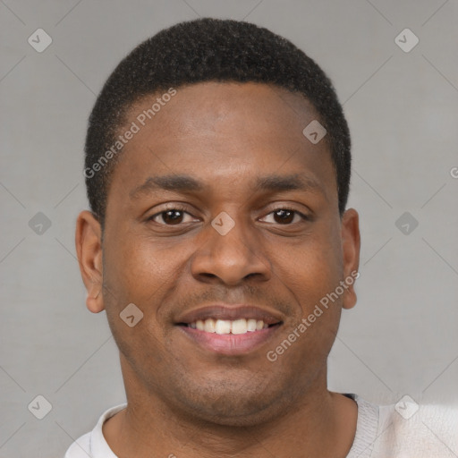 Joyful latino young-adult male with short  brown hair and brown eyes