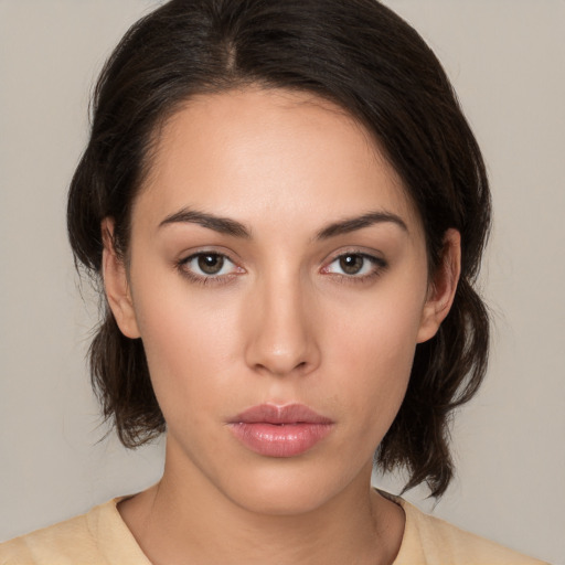 Neutral white young-adult female with medium  brown hair and brown eyes