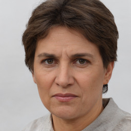 Joyful white adult female with short  brown hair and brown eyes