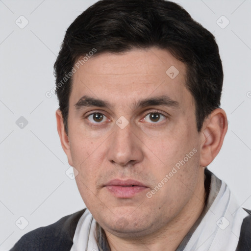 Neutral white adult male with short  brown hair and brown eyes