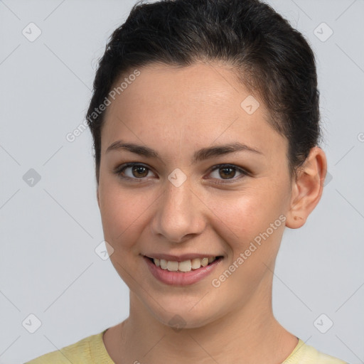 Joyful white young-adult female with short  brown hair and brown eyes