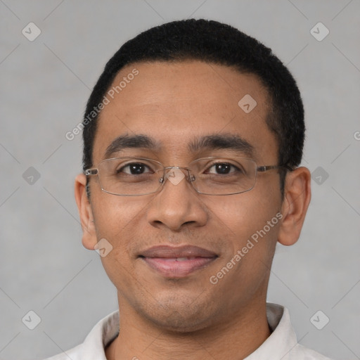 Joyful black young-adult male with short  black hair and brown eyes