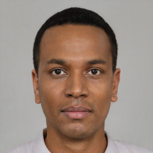 Neutral black young-adult male with short  black hair and brown eyes