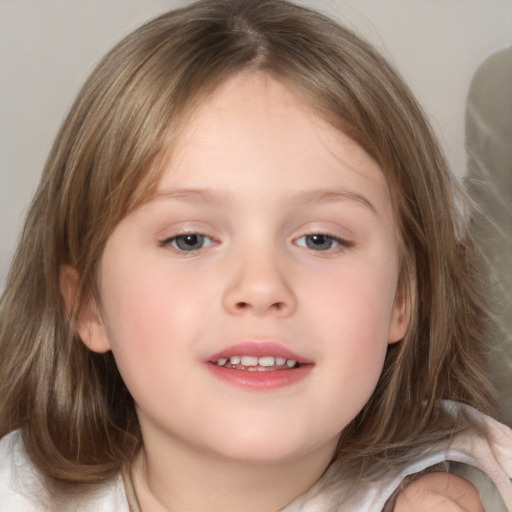 Joyful white child female with medium  brown hair and grey eyes