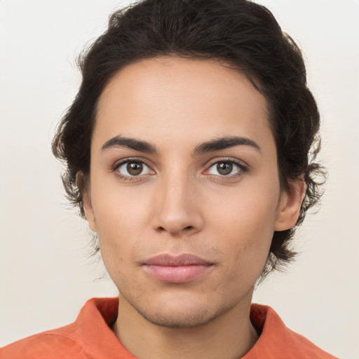 Neutral white young-adult female with short  brown hair and brown eyes