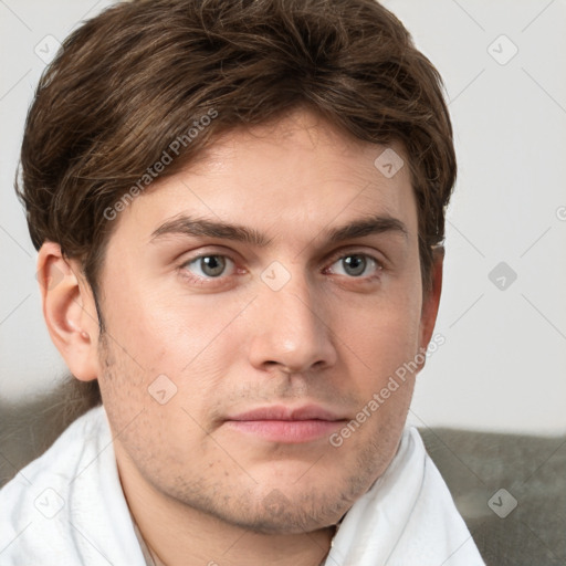 Neutral white young-adult male with short  brown hair and grey eyes