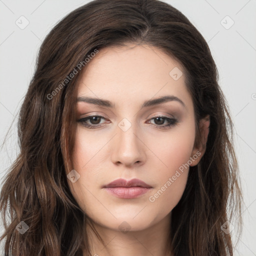 Neutral white young-adult female with long  brown hair and brown eyes