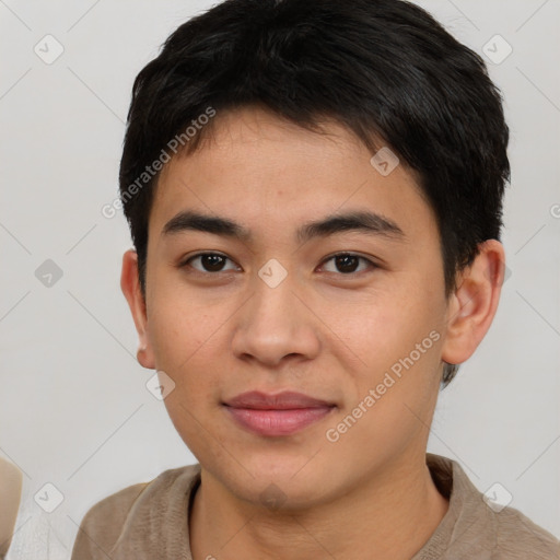 Joyful asian young-adult male with short  brown hair and brown eyes