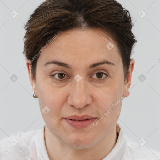 Joyful white adult female with short  brown hair and brown eyes