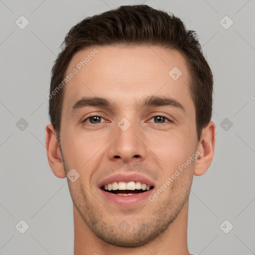 Joyful white young-adult male with short  brown hair and brown eyes