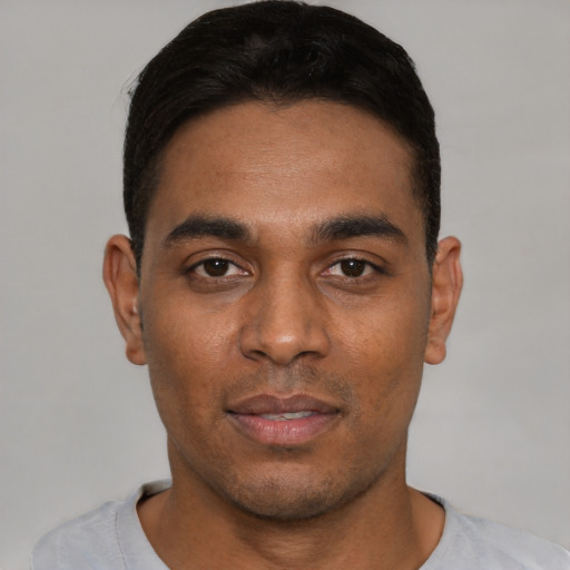 Neutral white young-adult male with short  black hair and brown eyes