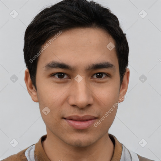 Joyful asian young-adult male with short  brown hair and brown eyes