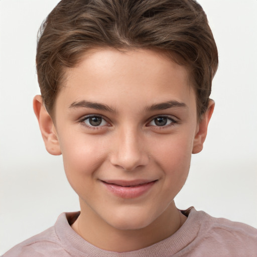 Joyful white child female with short  brown hair and brown eyes